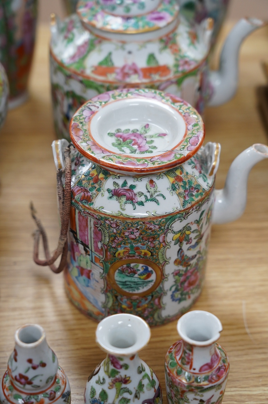 A group of 19th century and later Chinese famille rose porcelain vases and teapots, tallest 39cm high. Condition - poor